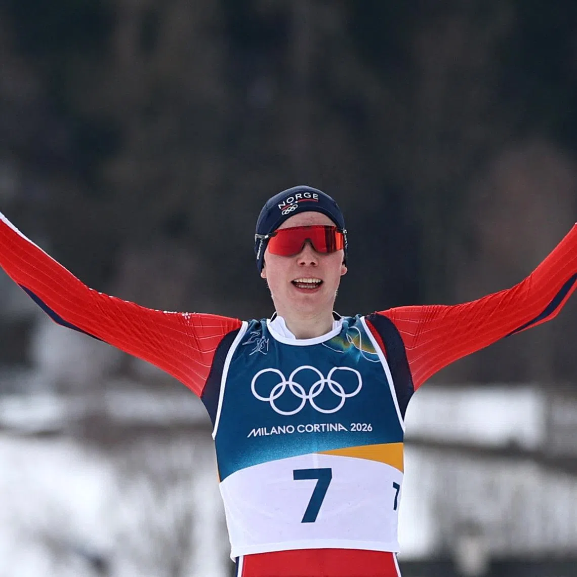 Milano Cortina 2026 Olympics - Nordic Combined - Individual Gundersen Normal Hill/10km, Cross-Country - Tesero Cross-Country Skiing Stadium, Lago, Italy - February 11, 2026. Jens Luraas Oftebro of Norway celebrates as he crosses the finish line to win the gold medal REUTERS/Kai Pfaffenbach