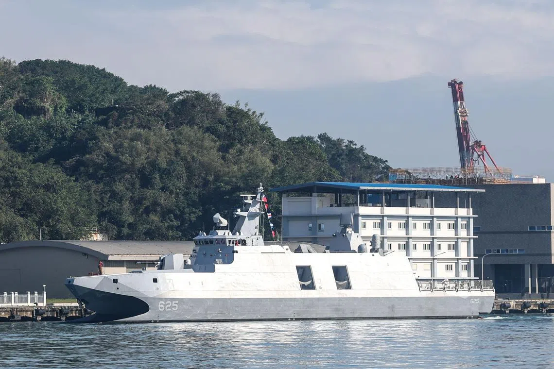 A Taiwanese Navy ship sails in the harbour in Keelung on December 11, 2024. Taiwan said on December 11 it had detected 53 Chinese military aircraft and 19 ships near the island in the past 24 hours, as Beijing holds its biggest maritime mobilisation in years. (Photo by I-Hwa CHENG / AFP)