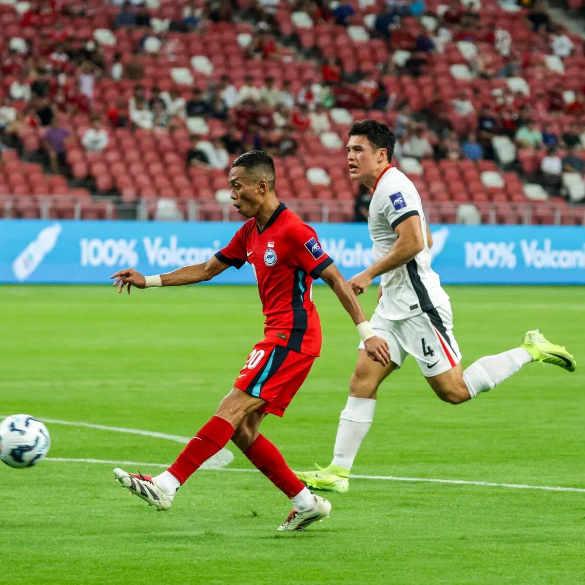 Singapore's Shawal Anuar (left) in action during the Asian Cup qualifier against Hong Kong at the National Stadium in March.