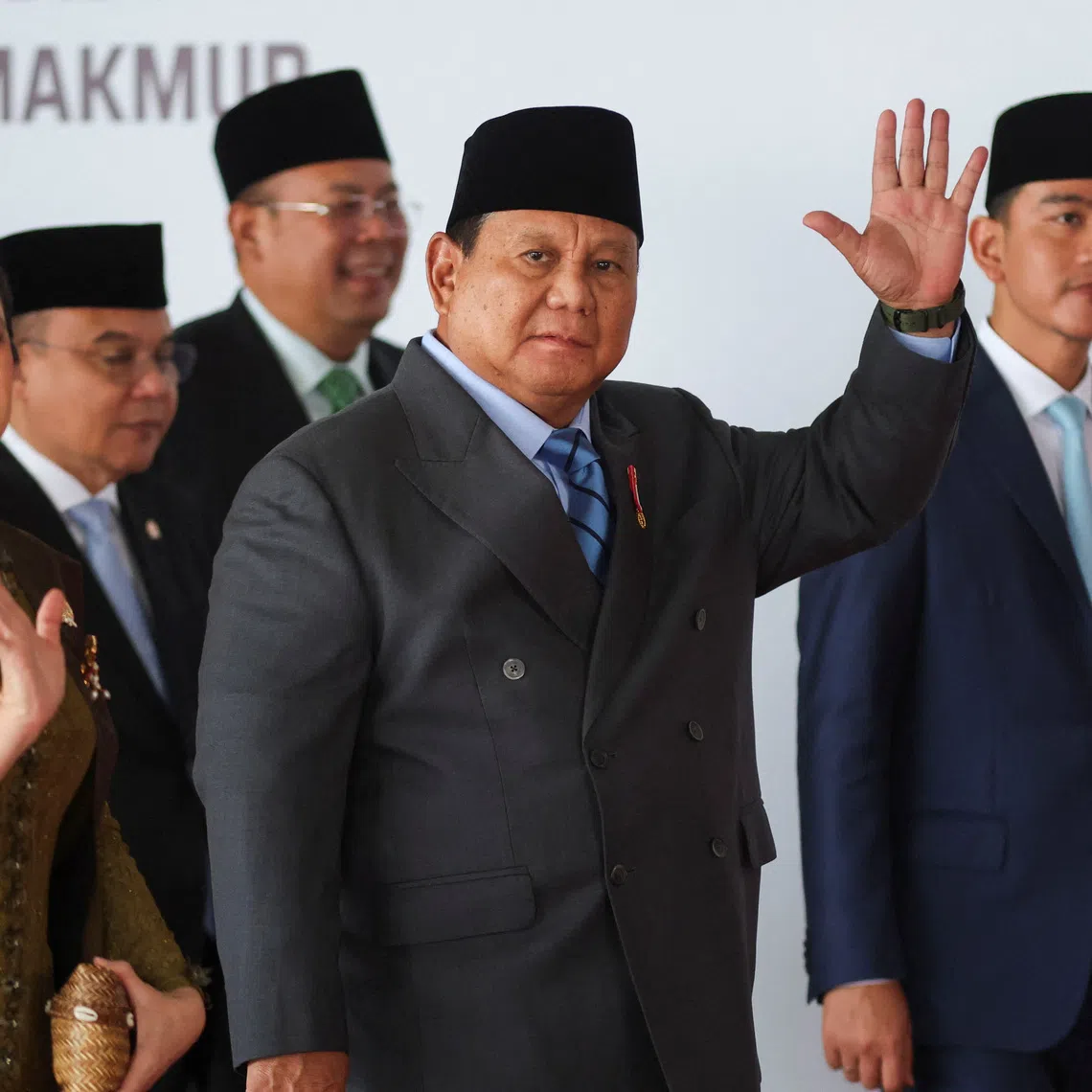 Indonesian President Prabowo Subianto (centre) and Indonesia’s Speaker of the House of Representatives Puan Maharani wave, as Vice President Gibran Rakabuming Raka walk next to them in Jakarta on Aug 14.