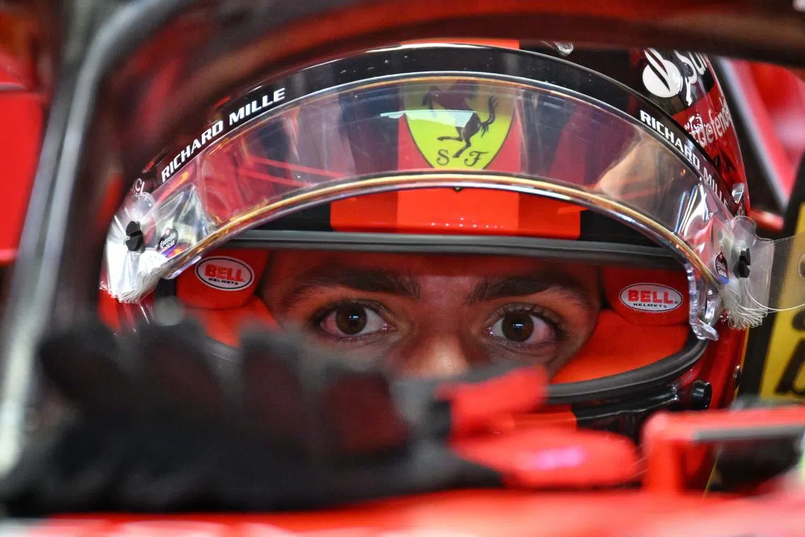 Carlos Sainz of Scuderia Ferrari sitting in his car before the race at the Formula One Singapore Airlines Singapore Grand Prix at Marina Bay street circuit on Sept 17.
