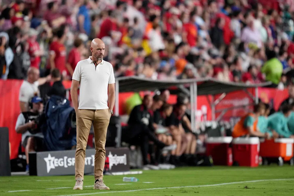 COLUMBIA, SOUTH CAROLINA - AUGUST 03: Head coach Erik ten Hag of Manchester United watches his team play against Liverpool during a pre-season friendly match at Williams-Brice Stadium on August 03, 2024 in Columbia, South Carolina.   Grant Halverson/Getty Images/AFP (Photo by GRANT HALVERSON / GETTY IMAGES NORTH AMERICA / Getty Images via AFP)