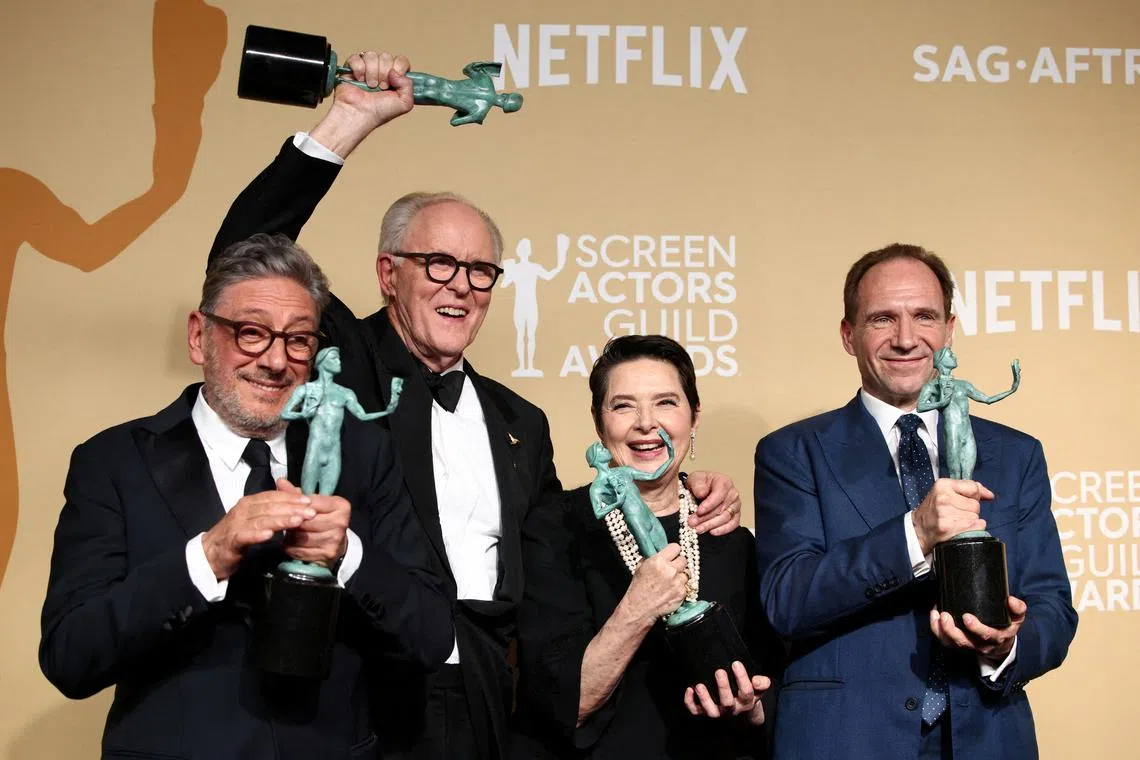 John Lithgow, Ralph Fiennes, Sergio Castellitto and Isabella Rossellini pose with the award for Outstanding Performance by a Cast in a Motion Picture for \"Conclave\" at the 31st Screen Actors Guild Awards, in Los Angeles, California, U.S., February 23, 2025. REUTERS/Daniel Cole       TPX IMAGES OF THE DAY