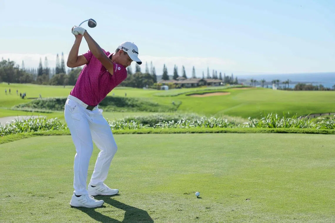Collin Morikawa of the United States plays his shot from the 12th tee during the second round of the Sentry Tournament of Champions at Plantation Course.