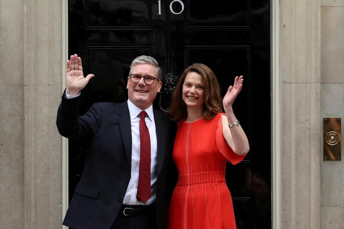 Incoming British Prime Minister Keir Starmer and his wife Victoria arrive at Number 10 Downing Street, following the results of the election, in London, Britain, July 5, 2024. REUTERS/Phil Noble