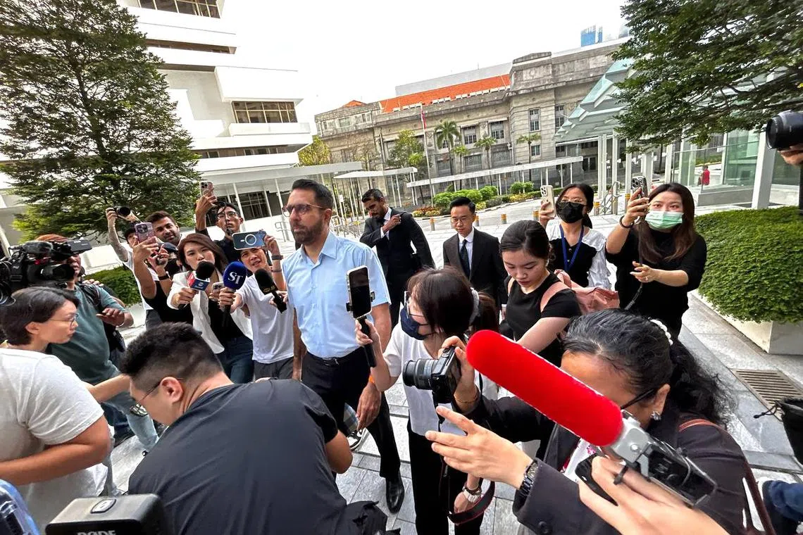 Leader of the Opposition, Pritam Singh, arriving at the State Courts, flanked by his lawyers Andre Jumabhoy and Aristotle Eng, in Singapore, on Feb 17 2025. The Workers' Party chief faces two charges of lying to a parliamentary committee over the case of former Member of Parliament Raeesah Khan.