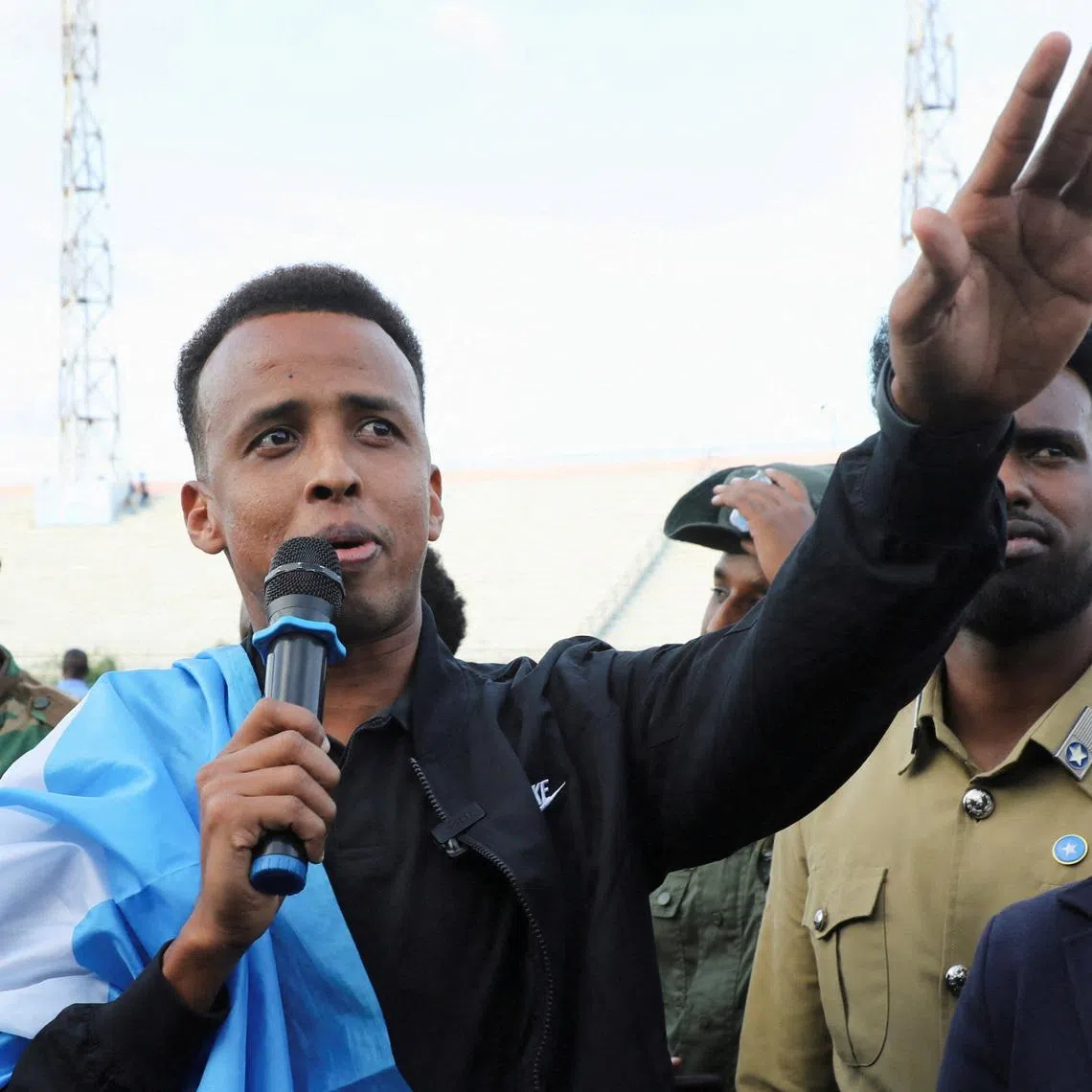 FILE PHOTO: Somali referee Omar Abdulkadir Artan, who was expected to officiate at matches during the 2026 FIFA World Cup but was denied entry to U.S., addresses fans at the Mogadishu stadium, in Mogadishu, Somalia, June 10, 2026 REUTERS/Feisal Omar/File Photo