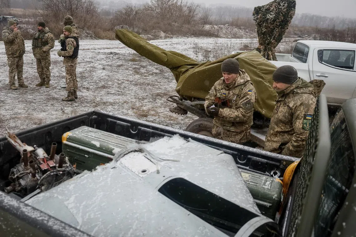 Ukrainian servicemen from air defence units prepare for an award ceremony after repelling the second biggest Russian missile and drone attack in five days, amid Russia's attack on Ukraine, near Kyiv, Ukraine January 3, 2024. REUTERS/Gleb Garanich/File Photo