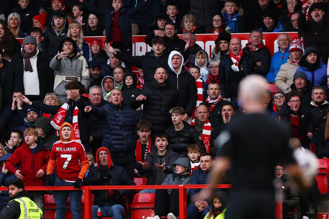 Soccer Football - Premier League - Nottingham Forest v Liverpool - The City Ground, Nottingham, Britain - March 2, 2024 Nottingham Forest fans react after referee Paul Tierney stops play following an injury to Liverpool's Ibrahima Konate Action Images via Reuters/Andrew Boyers