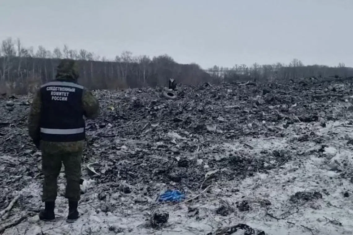 A view shows the crash site of the Russian Ilyushin Il-76 military transport plane near the village of Yablonovo in the Belgorod region, Russia, in this image published January 25, 2024. Russian Investigative Committee/Handout via REUTERS/File Photo