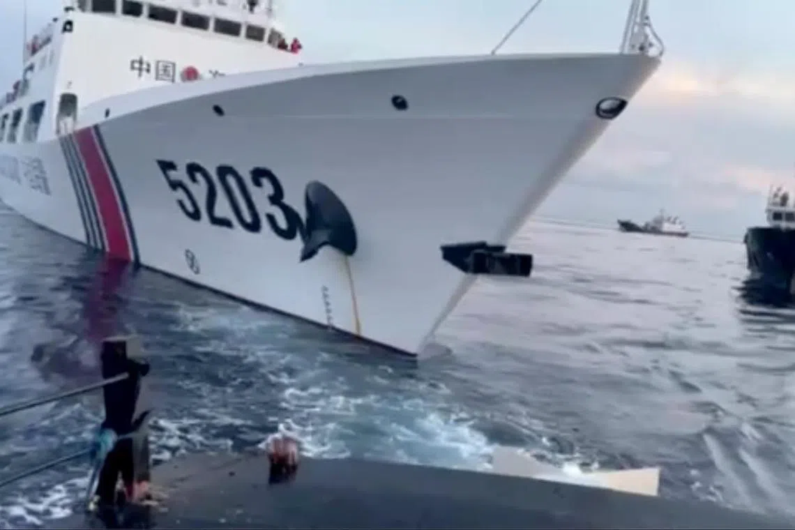 A Chinese coast guard ship (left) after a collision with a Philippine supply boat as they approached Second Thomas Shoal in the South China Sea on Sunday.