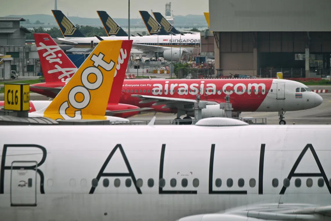 Singapore Airlines, AirAsia and Scoot aircraft at Changi Airport on 2 June 2022.