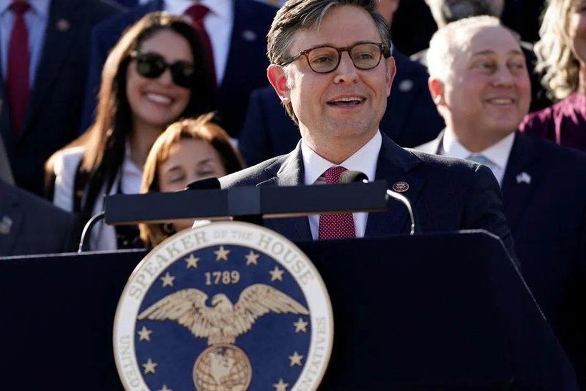 Newly elected Speaker of the House Mike Johnson (R-LA) makes a statement to reporters and television cameras on the outer steps of the House of Representatives as he stands in front of members of the Republican conference after being elected the new Speaker at the U.S. Capitol in Washington, U.S., October 25, 2023. REUTERS/Elizabeth Frantz