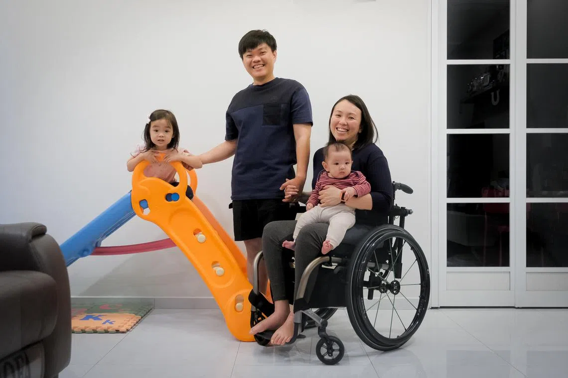 Ms Jean Ling, who plans to be a full-time mum for at least two months, with her husband and their children.