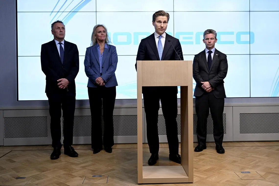 Finnish Defence Minister Antti Hakkanen (podium) at the Nordic Defence Cooperation meeting on Nov 12, with (from left) Norwegian Defence Minister Tore O. Sandvik, Icelandic Foreign Minister Thorgerdur Katrin Gunnarsdottir and Swedish Defence Minister Pal Jonson.