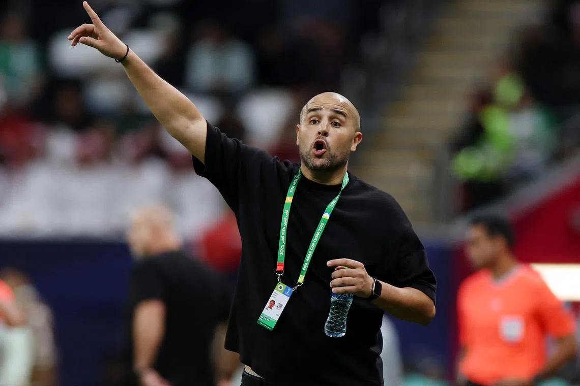 Soccer Football - FIFA Arab Cup - Qatar 2025 - Quarter Final - United Arab Emirates v Algeria - Al Bayt Stadium, Al Khor, Qatar - December 12, 2025 Algeria coach Madjid Bougherra reacts REUTERS/Ibraheem Al Omari