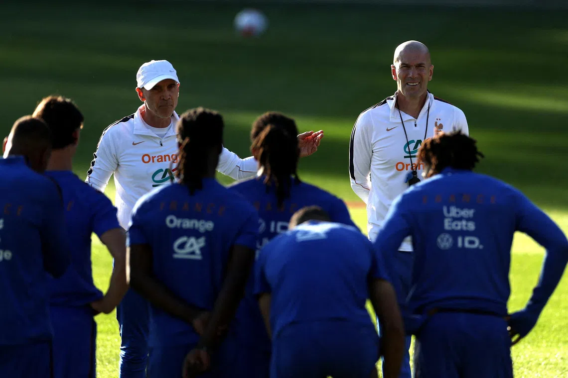 France coach Zinedine Zidane (right) and assistant coach David Bettoni at a training session in Clairefontaine-en-Yvelines, France on Sept 21, 2026.