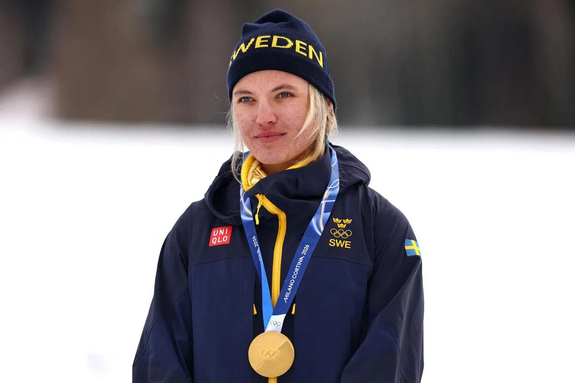 Milano Cortina 2026 Olympics - Cross-Country Skiing - Women's Sprint Classic Victory Ceremony - Tesero Cross-Country Skiing Stadium, Lago, Italy - February 10, 2026. Gold medallist Linn Svahn of Sweden stands on the podium during the Women's Sprint Classic Victory Ceremony REUTERS/Kai Pfaffenbach