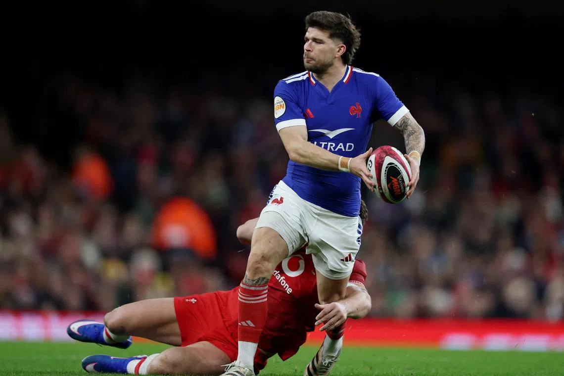 Rugby Union - Six Nations Championship - Wales v France - Principality Stadium, Cardiff, Wales, Britain - February 15, 2026 France's Matthieu Jalibert in action with Wales' Eddie James. Action Images via Reuters/Paul Childs