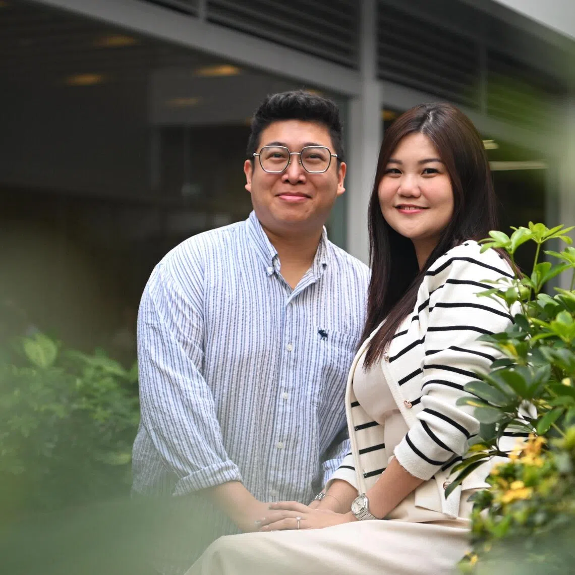 Insurance agent Rachelle Yeo (right), 29, was diagnosed with Ornithine Transcarbamylase (OTC) deficiency when she was 18 months old. The condition stops her body from breaking down protein. As Ms Yeo and her fiance Luis Teo, 31, will be getting married next year and starting a family, doctors will need to monitor her closely as expectant mothers need protein for the baby to grow..

ST PHOTO: AZMI ATHNI