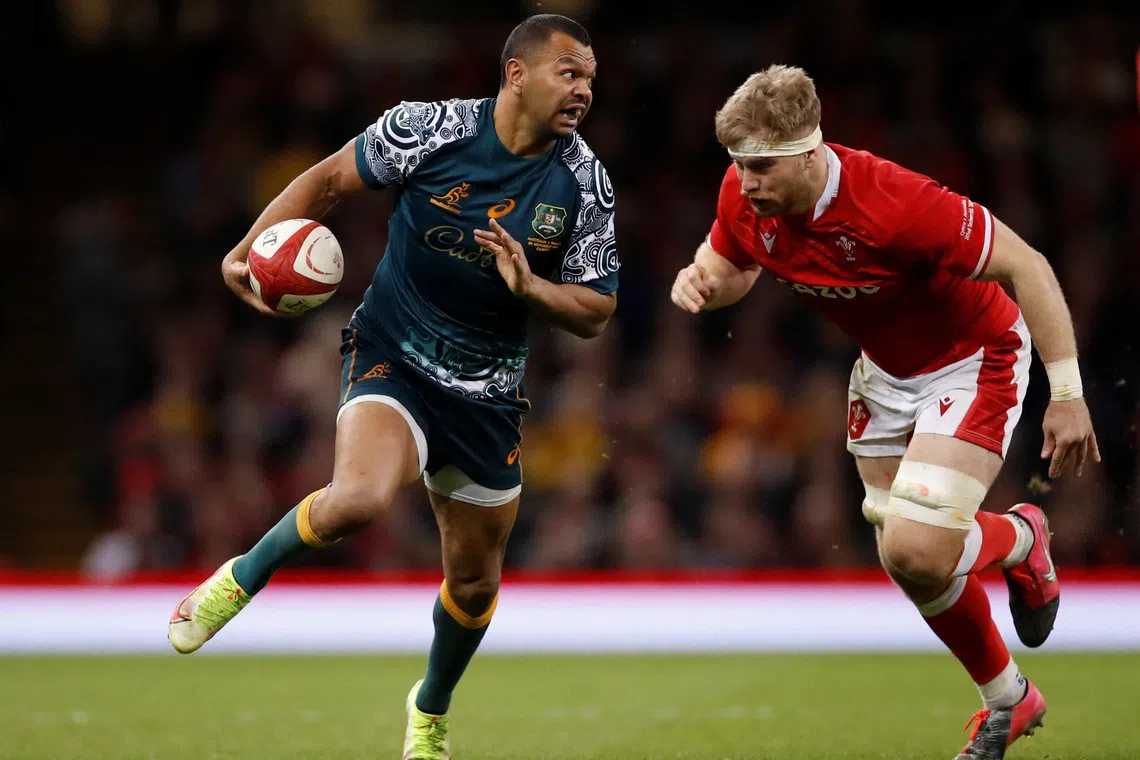 FILE PHOTO: Rugby Union - Autumn International - Wales v Australia - Principality Stadium, Cardiff, Wales, Britain - November 20, 2021 Australia's Kurtley Beale in action with Wales' Aaron Wainwright Action Images via Reuters/Andrew Boyers/File Photo