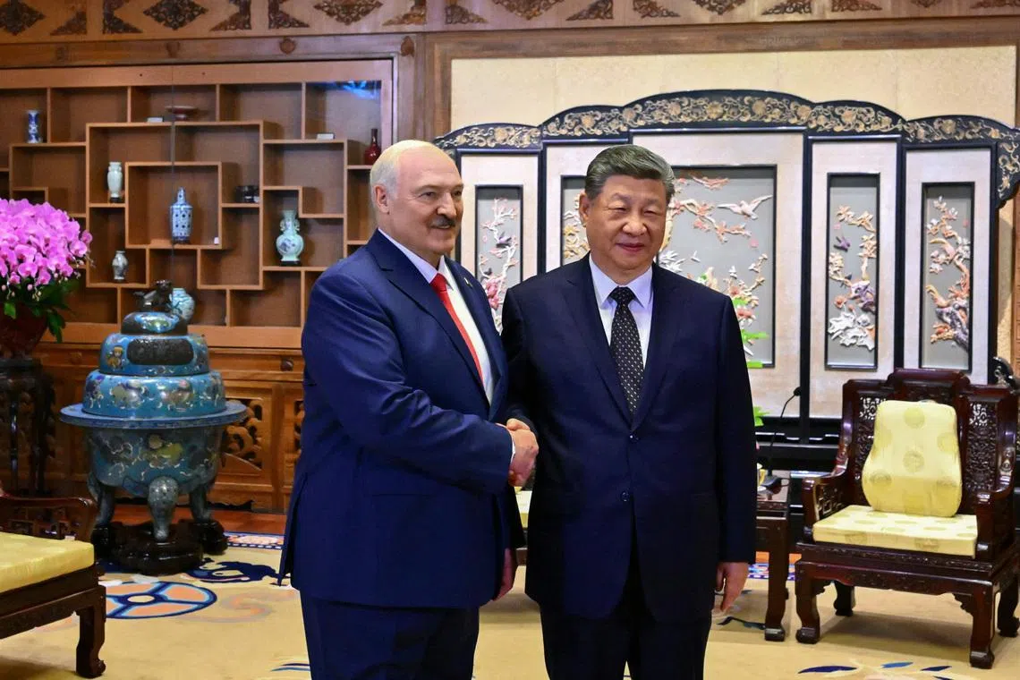 Belarusian President Alexander Lukashenko shakes hands with Chinese President Xi Jinping during a meeting in Beijing, China June 29, 2026. President of the Republic of Belarus/Handout via REUTERS