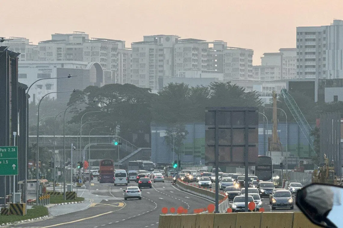 Traffic along Ang Mo Kio Ave 3 on Oct 11, 2023, at 7am. The 24-hr PSI reading in central Singapore at 7am was 85.