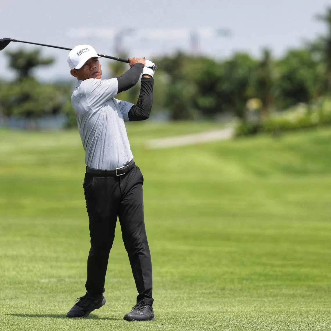 Monn Sokchea of Cambodia driving from the fairway in round 3 of the men’s Putra Cup at the South-east Asian Amateur Golf Team Championships at Seletar Country Club on July 11, 2024.
