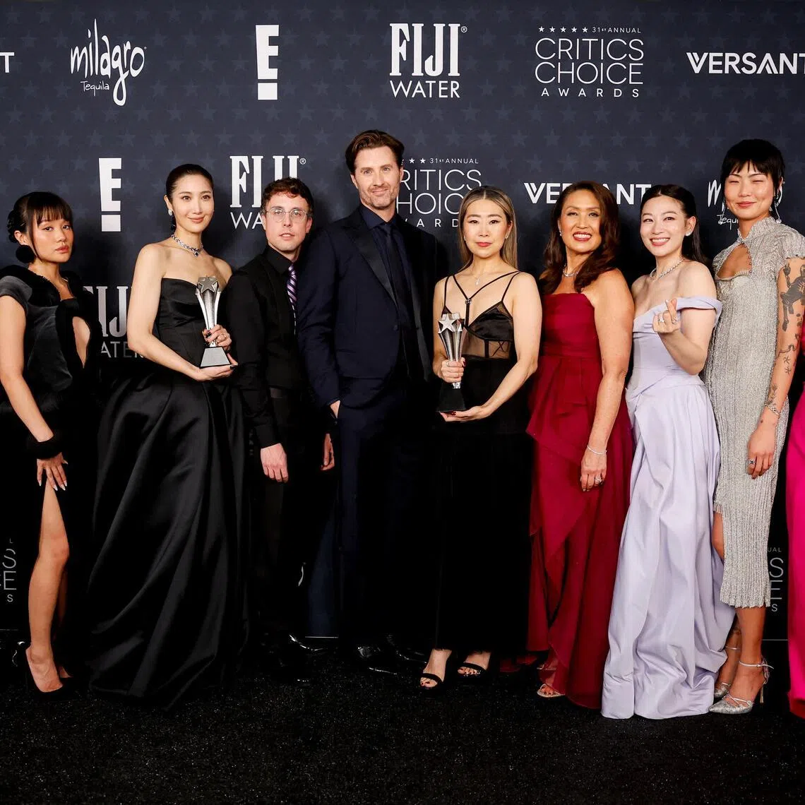 (From left) Audrey Nuna, Rei Ami, Ejae, Mark Sonnenblick, Chris Appelhans, Maggie Kang, Michelle Wong, Arden Cho, May Hong and Ji-young Yoo with the Best Animated Feature award for KPop Demon Hunters at the Critics Choice Awards on Jan 4.