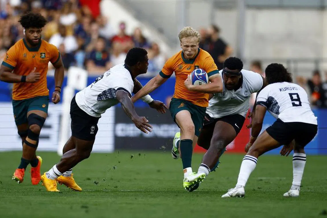 FILE PHOTO: Rugby Union - Rugby World Cup 2023 - Pool C - Australia v Fiji - Stade Geoffroy-Guichard, Saint-Etienne, France - September 17, 2023  Australia's Carter Gordon in action REUTERS/Sarah Meyssonnier/File Photo