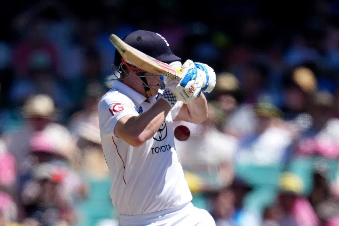 Cricket - The Ashes - Australia v England - Fifth Test - Sydney Cricket Ground, Sydney, Australia - January 7, 2026 England's Harry Brook in action with Australia's Cameron Green REUTERS/Asanka Brendon Ratnayake