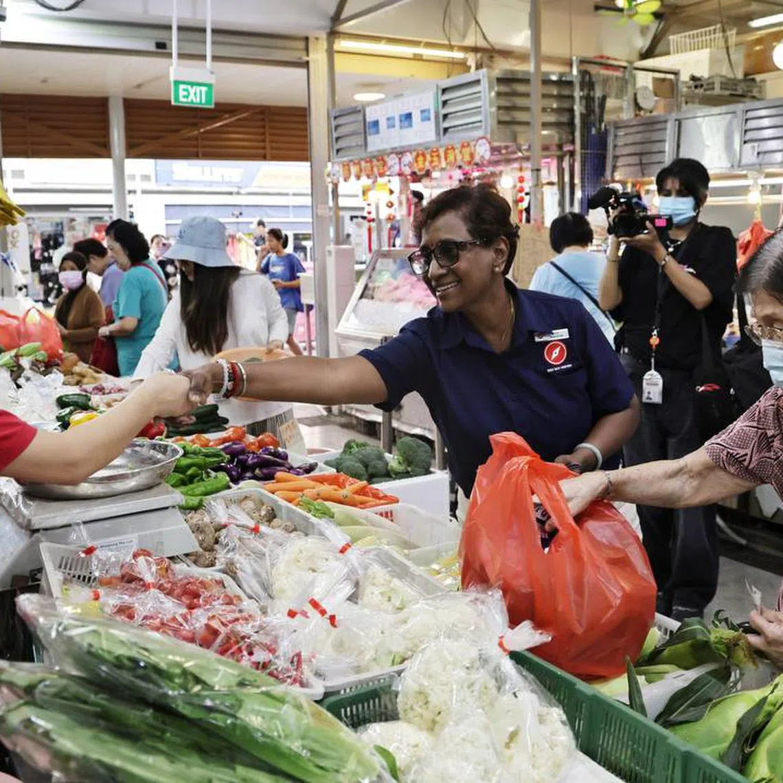 Red Dot United party candidate Kala Manickam for Jurong Central SMC during a walkabout at a wet market at Jurong Central Plaza on April 29.