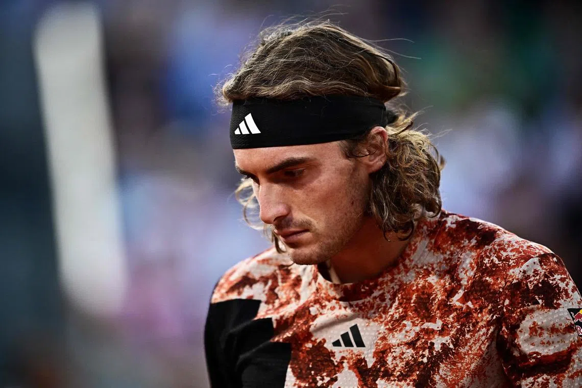 It marks the third consecutive time Greece's Stefanos Tsitsipas has been knocked out in the second round of the Wimbledon warm-up tournament.