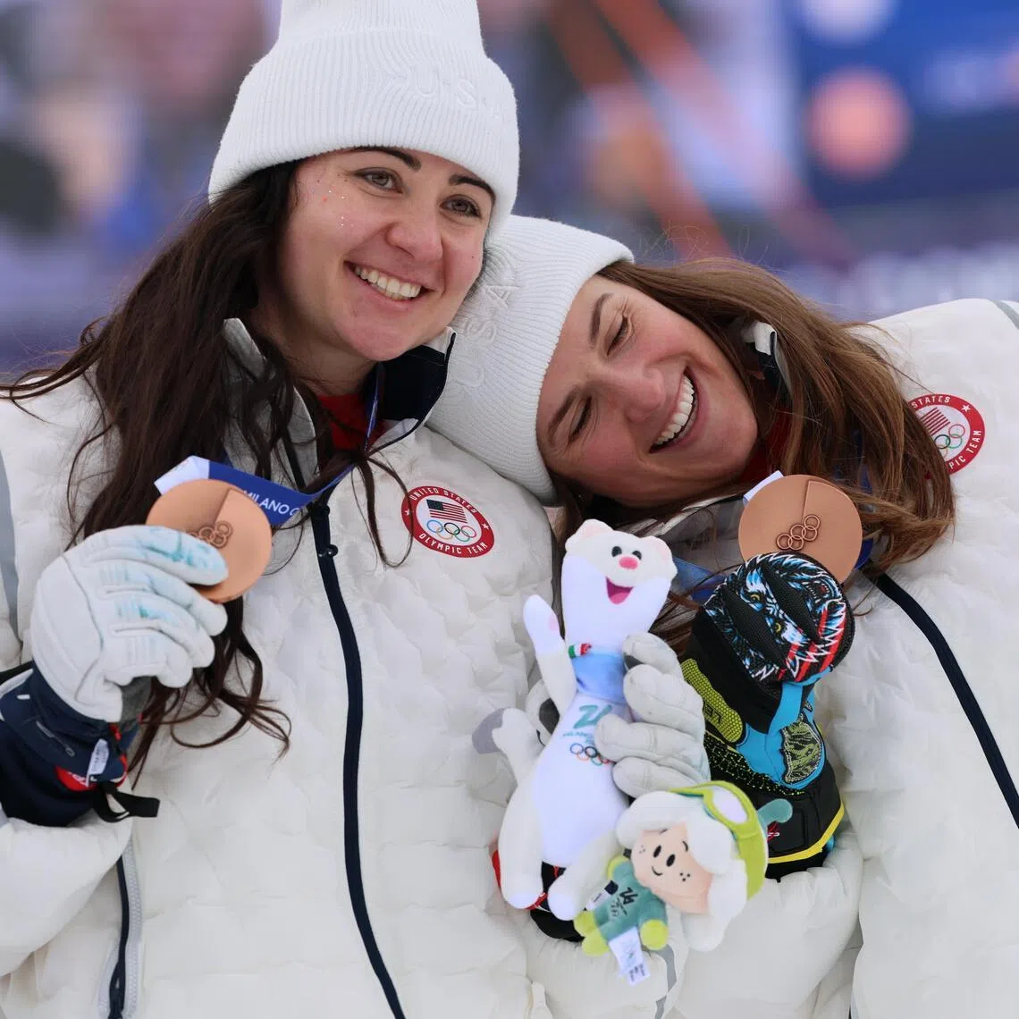 Paula Moltzan and Jacqueline Wiles of the US posing with their bronze medals for the women’s team combined on Feb 10. Wiles became the latest competitor to suffer a medal mishap.