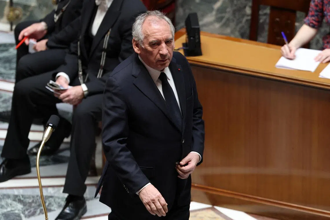 FILE PHOTO: French Prime Minister Francois Bayrou attends the questions to the government session at the National Assembly in Paris, France, April 1, 2025. REUTERS/Gonzalo Fuentes/File Photo