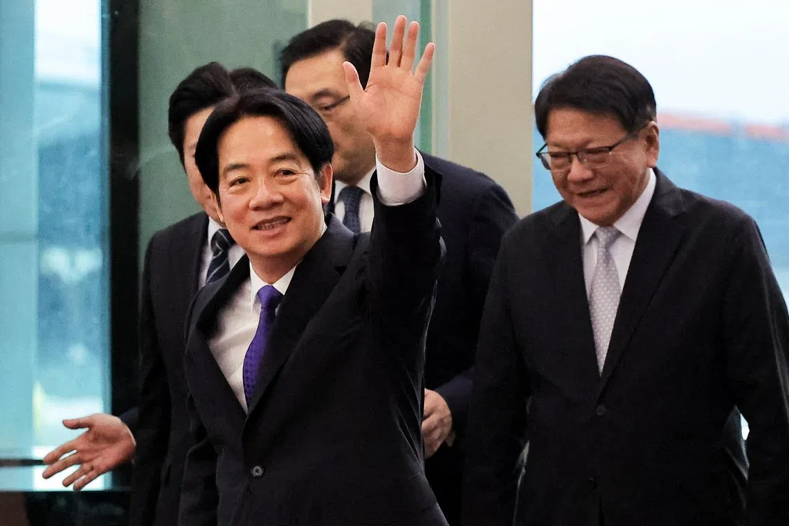 Taiwan President Lai Ching-te waves as he leaves for a trip to Hawaii, Guam and the Pacific Island allies at the airport in Taoyuan, Taiwan November 30, 2024. REUTERS/Ann Wang/File Photo