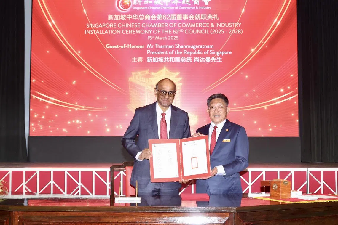 President Tharman Shanmugaratnam and Singapore Chinese Chamber of Commerce and Industry (SCCCI) president Kho Choon Keng at SCCCI's 62nd installation ceremony.