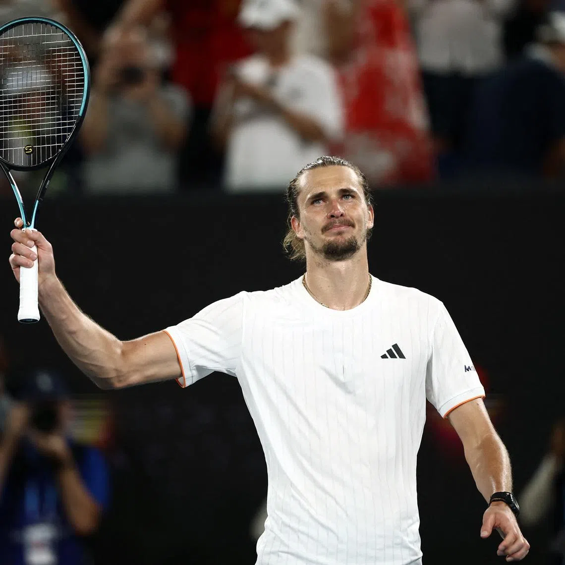 Tennis - Australian Open - Melbourne Park, Melbourne, Australia - January 27, 2026 Germany's Alexander Zverev celebrates after winning his quarter final match against Learner Tien of the U.S. REUTERS/Tingshu Wang
