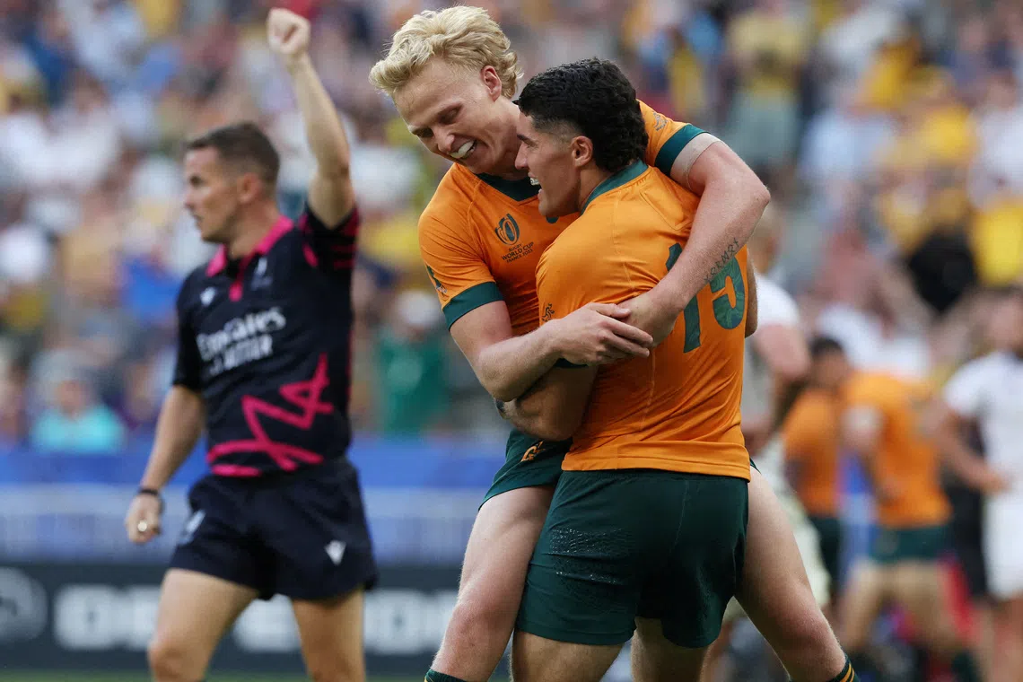 FILE PHOTO: Rugby Union - Rugby World Cup 2023 - Pool C - Australia v Georgia - Stade de France, Saint-Denis, France - September 9, 2023 Australia's Ben Donaldson celebrates scoring their third try with teammate Carter Gordon REUTERS/Stephanie Lecocq/File Photo