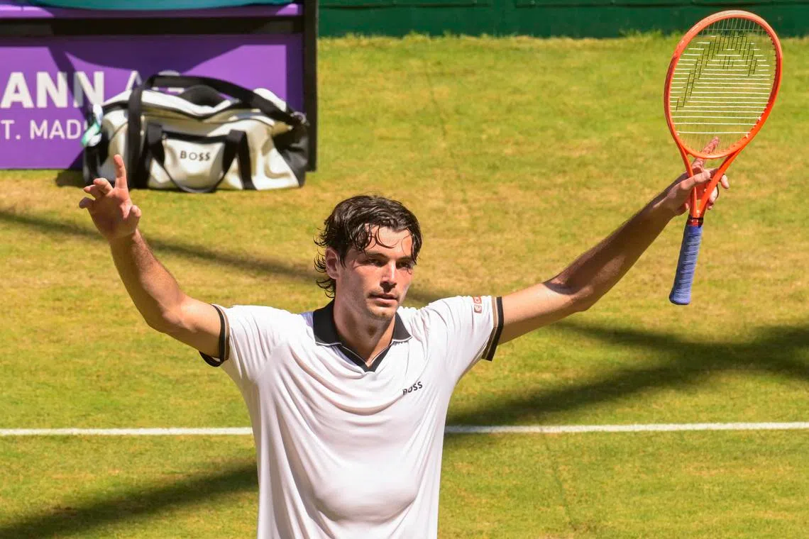 FILE PHOTO: Tennis - ATP 500 - Halle Open - OWL Arena, Halle, Germany - June 19, 2026 Taylor Fritz of the U.S. celebrates after winning his quarter final match against Ben Shelton of the U.S. REUTERS/Fabian Bimmer/File photo