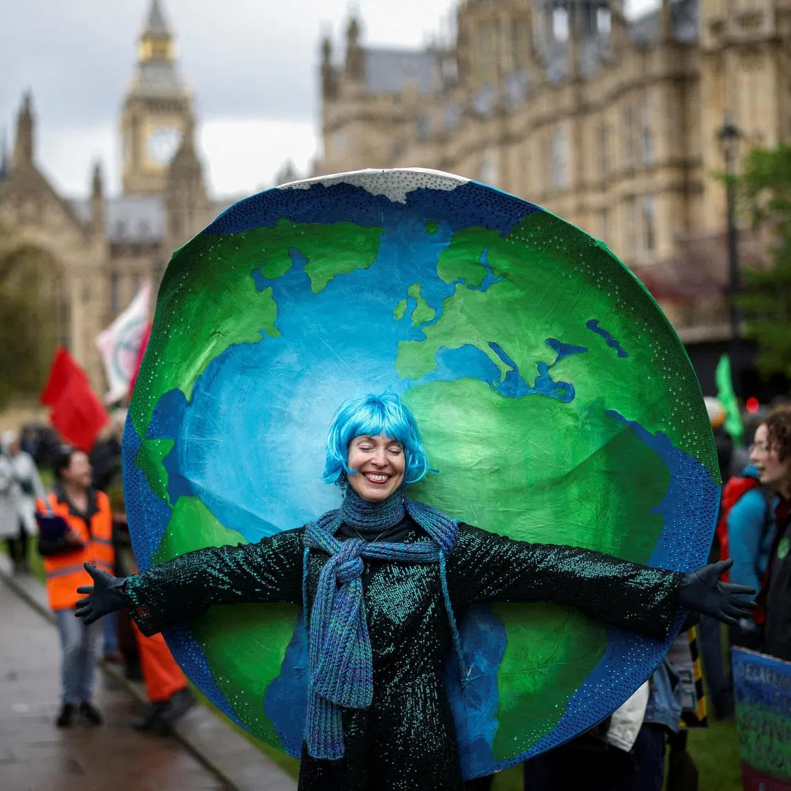 A demonstrator wears a costume as people protest during the Extinction Rebellion's 'The Big One' event, in London, Britain, April 21, 2023. REUTERS/Henry Nicholls     TPX IMAGES OF THE DAY     