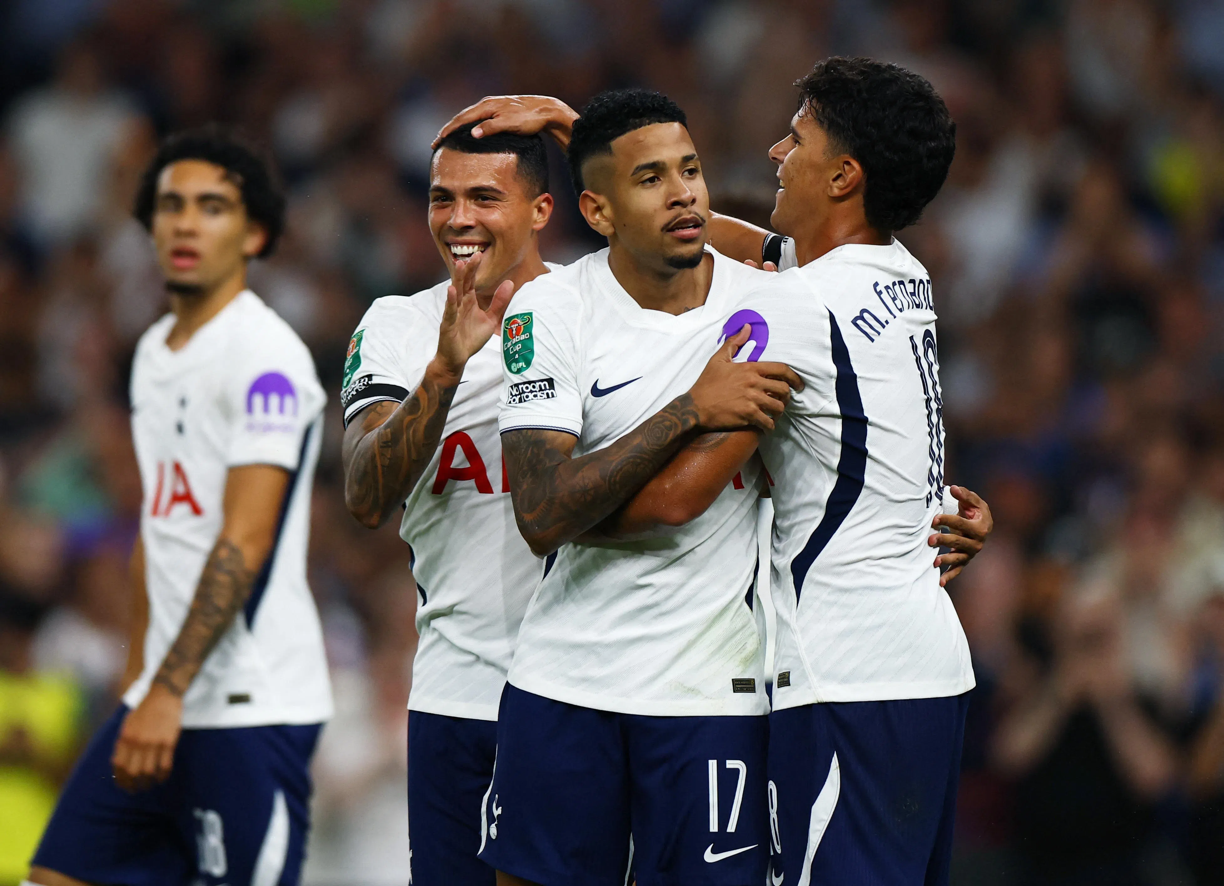 Tottenham Hotspur’s Savinho celebrates scoring their fourth goal with Mateus Fernandes and Pedro Porro.