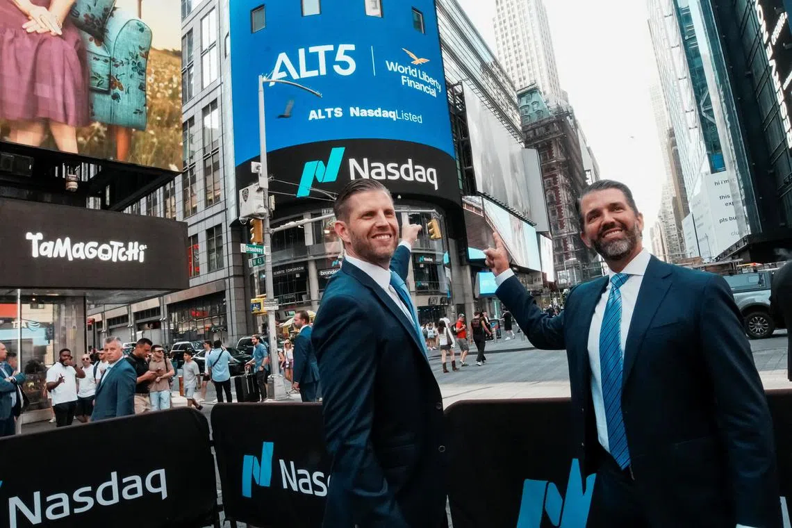 Donald Trump Jr. and Eric Trump outside the Nasdaq building in New York.