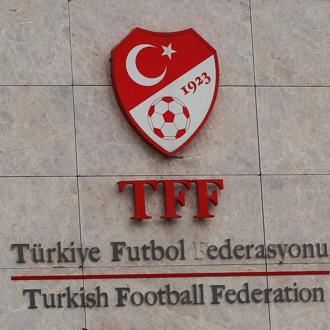 A logo of the Turkish Football Federation (TFF) is seen at the entrance of Riva Hasan Dogan national team training centre and education facilities in Istanbul, Turkey December 12, 2023. REUTERS/Dilara Senkaya