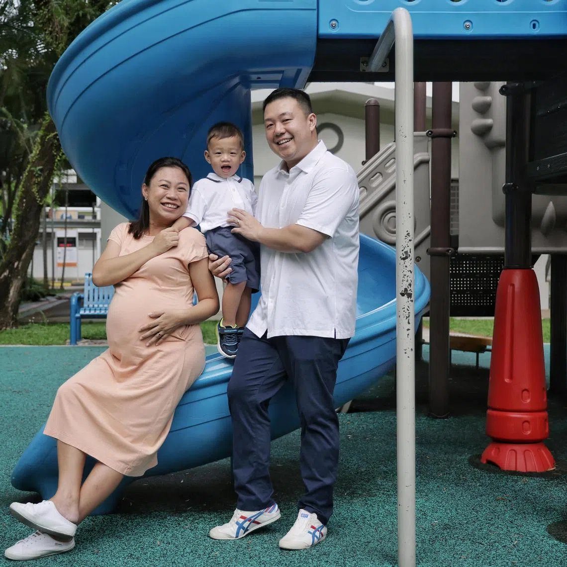 (From left) Ms Lim Wen Ling, 43, her son Evan, two, and husband, Eddy Goh, 41, on May 8, 2024. Ms Lim Wen Ling, 43, and her husband, Eddy Goh, 41, are proud parents to Evan, who is born in April 2022. Wen Ling suffered 5 miscarriages before carrying the baby to term through pre-implementation genetic screening (PGS) IVF. Through this method, problematic embryos, such as those with genetic illnesses, are not implanted to increase the chances of pregnancy etc. Wen Ling is now pregnant with her second child through PGS IVF as well. This is a story on more couples embarking on IVF and KK Women's and Children's Hospital expanding their IVF facilities.