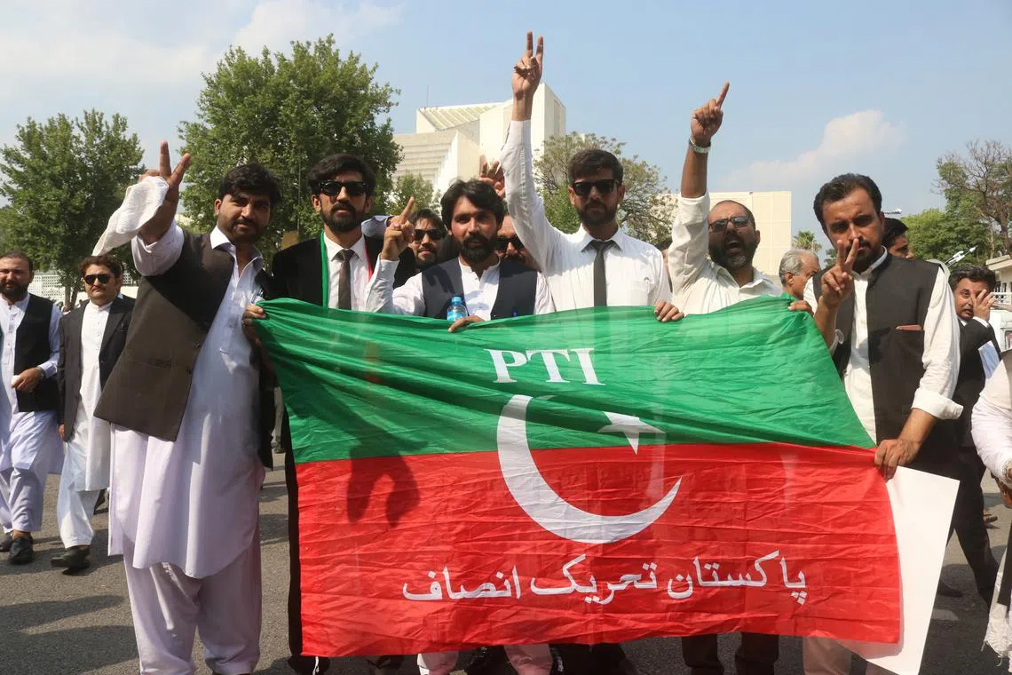 Pakistan Tehrik-e-Insaf supoorters protest to demand for the release of former Prime Minister Imran Khan, in Islamabad on July 11.