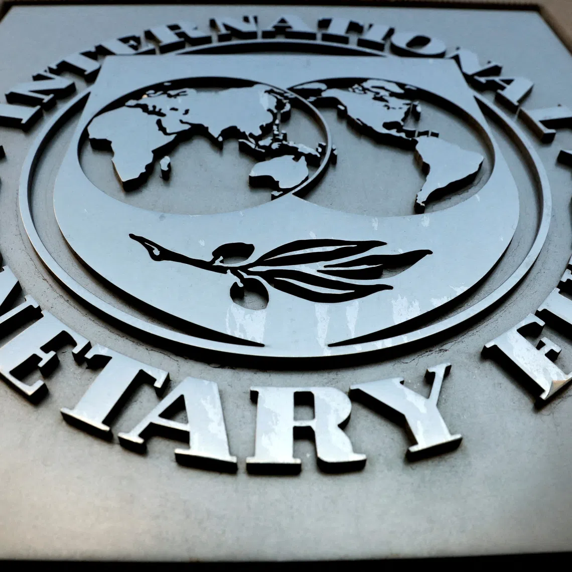 FILE PHOTO: The International Monetary Fund logo is seen outside the headquarters building in Washington, U.S. September 4, 2018. REUTERS/Yuri Gripas/File Photo