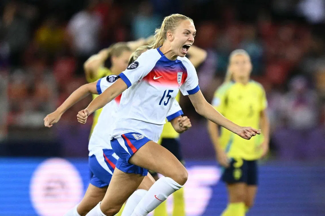 England defender Esme Morgan celebrates at the end of the match.
