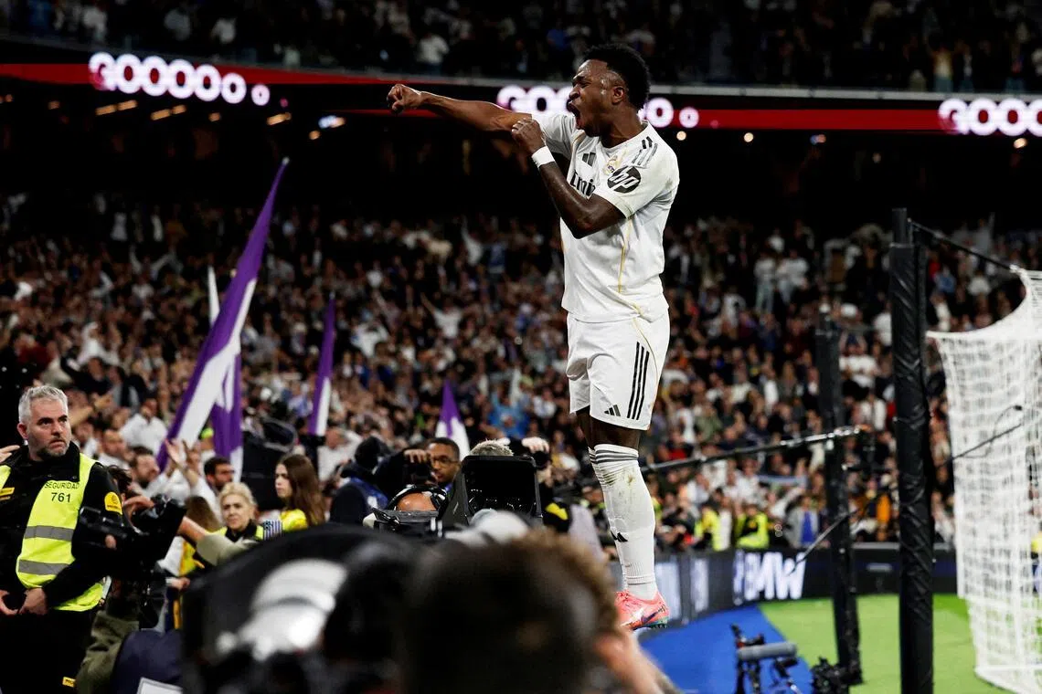 Vinicius Jr celebrates his winner in Real Madrid's 3-2 La Liga success over Atletico Madrid in the Madrid derby at the Santiago Bernabeu on March 22, 2026. 