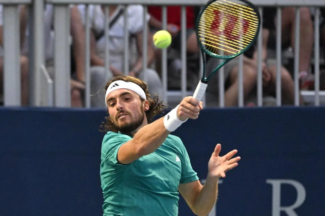 FILE PHOTO: Jul 30, 2025; Toronto, ON, Canada;  Stefanos Tsitsipas (GRE) plays a shot against Christopher O'Connell (AUS) during second round play at Sobeys Stadium. Mandatory Credit: Dan Hamilton-Imagn Images/File Photo